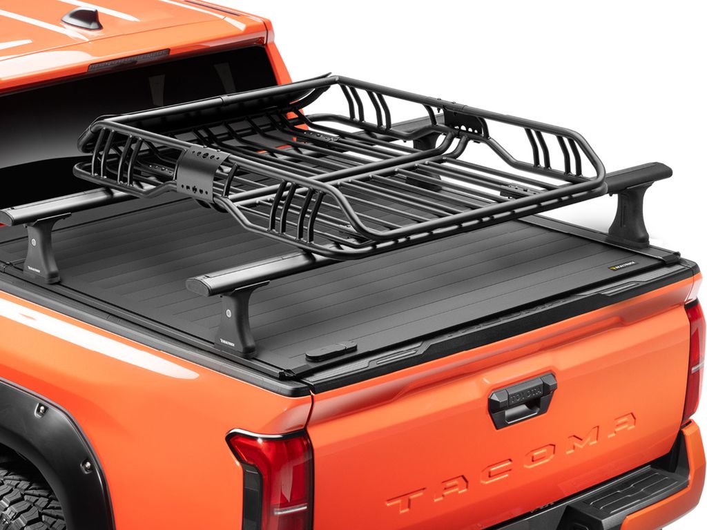 RealTruck Elevate Cargo Basket shown empty on top of roof rack of truck