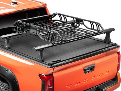 RealTruck Elevate Cargo Basket shown empty on top of roof rack of truck