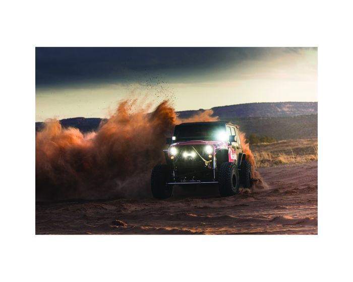 Off-road vehicle with a pair of D-XL Pro Driving LED Lights lighting the way
